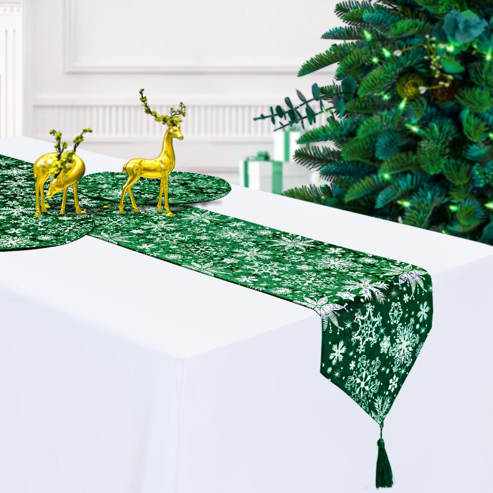 snowflake with sliver foil in green table runner with tassels